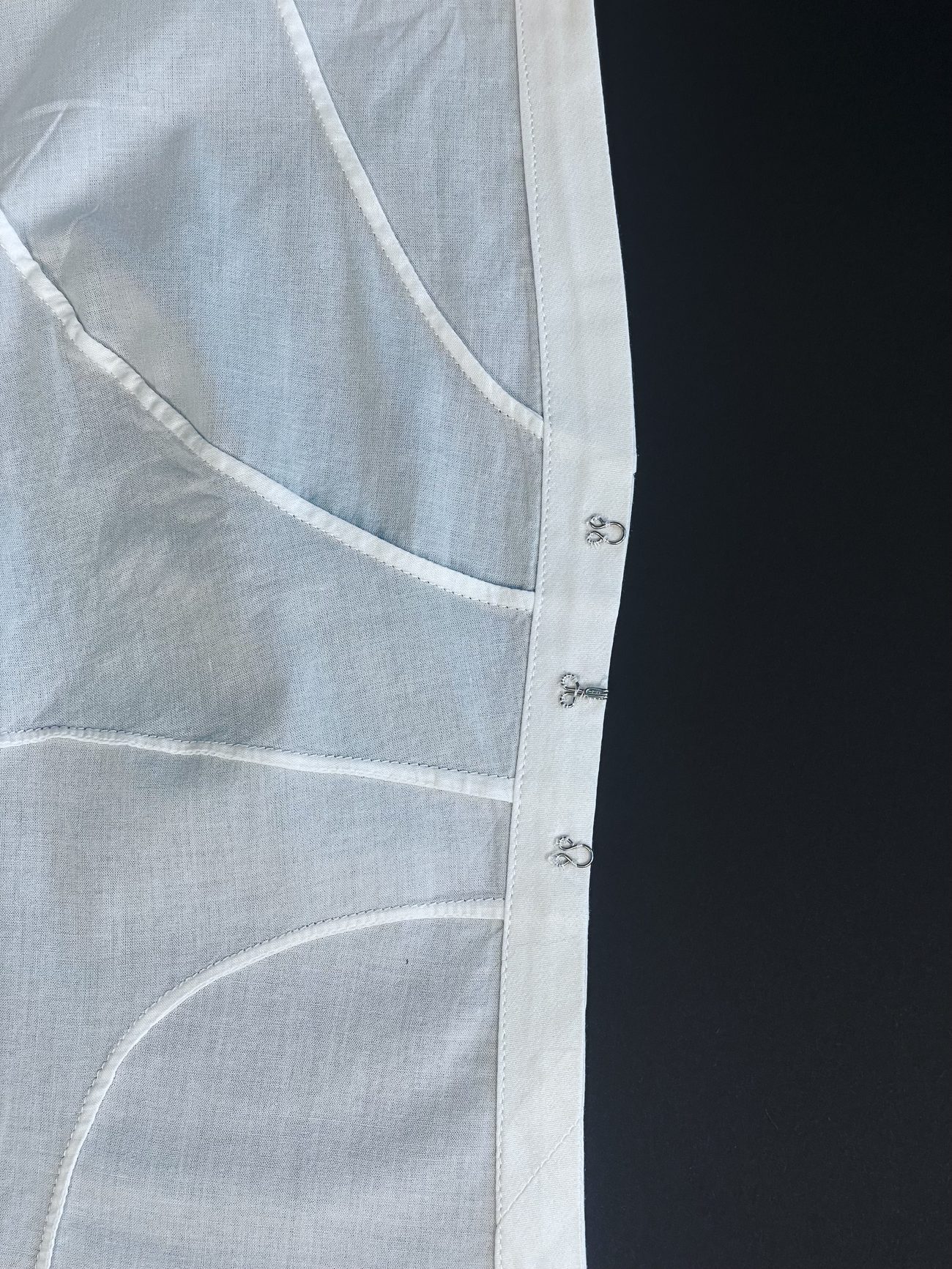 Garment interior showing French seams throughout
